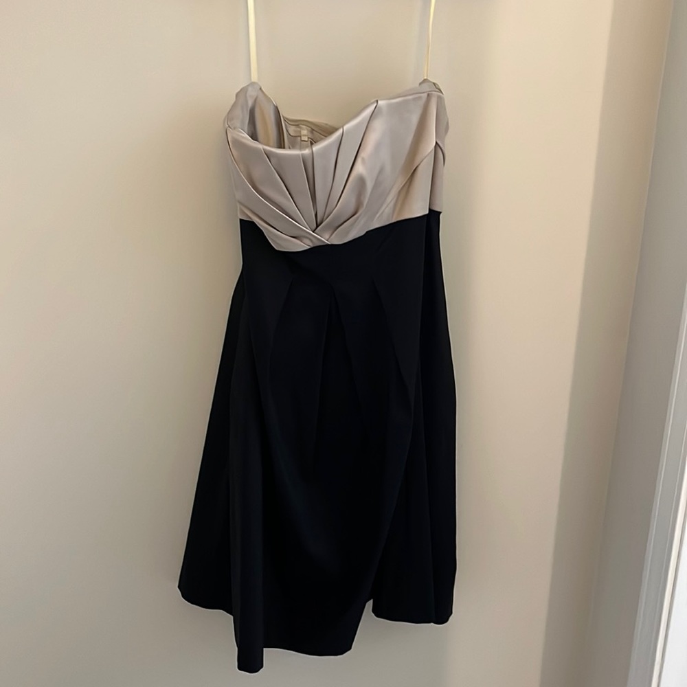 Strapless mid length dress with pockets, size 4.